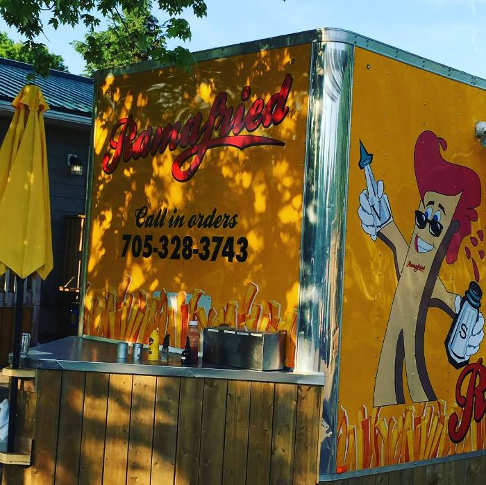 Branded food trailer with custom graphics