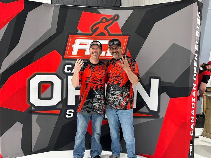 Redline branded event display and team jerseys