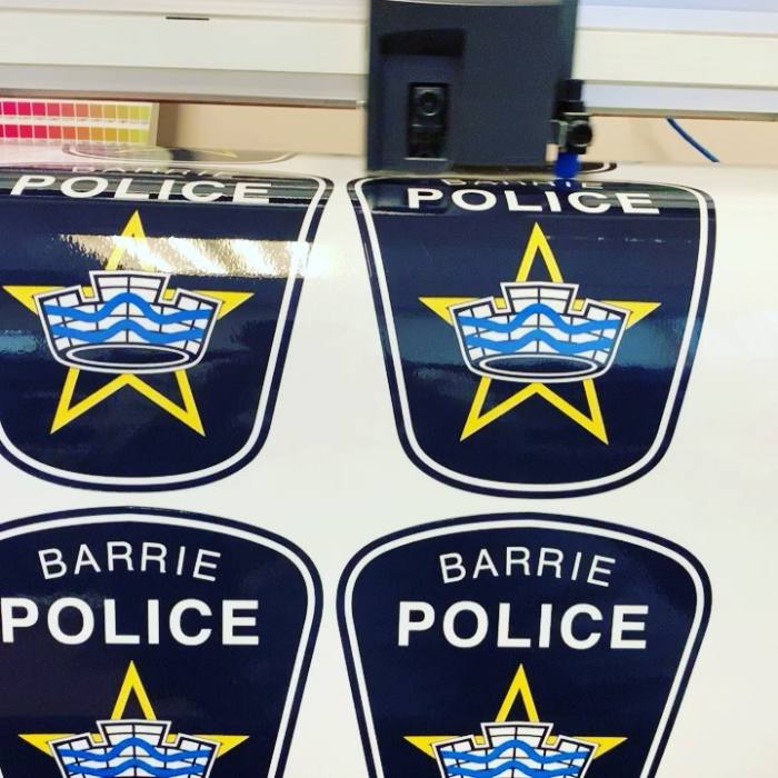 Vinyl decals applied to a service vehicle
