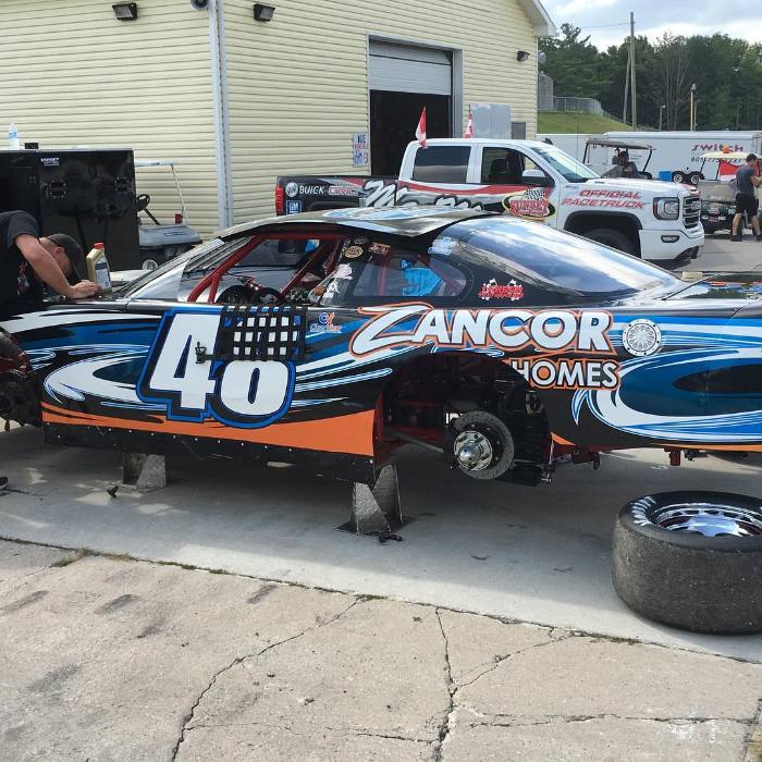 Blue and orange wrapped race car